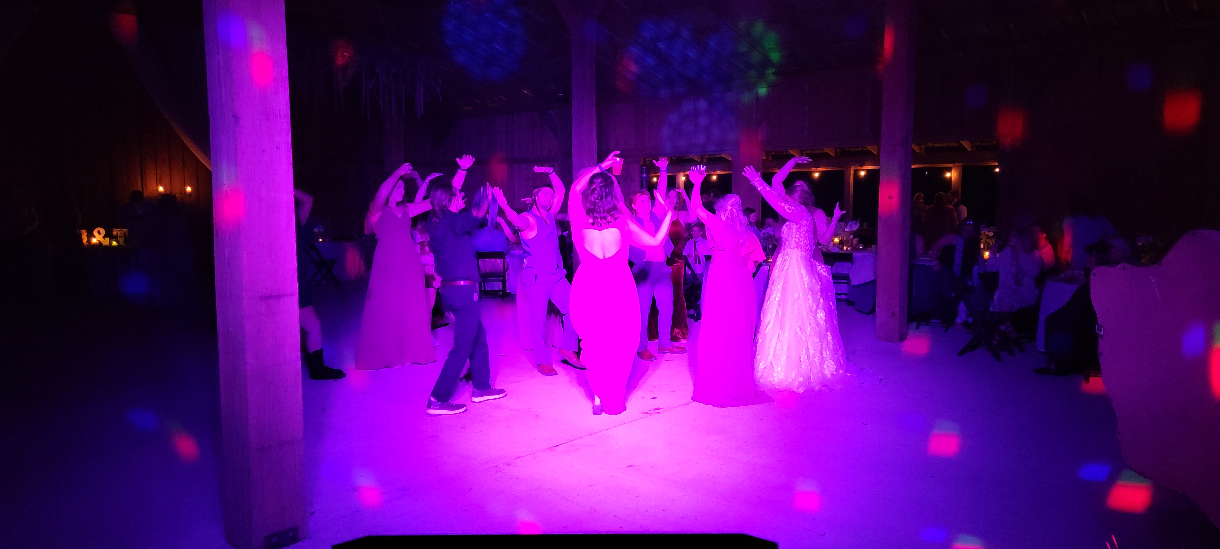 Wedding dance floor with purple lighting